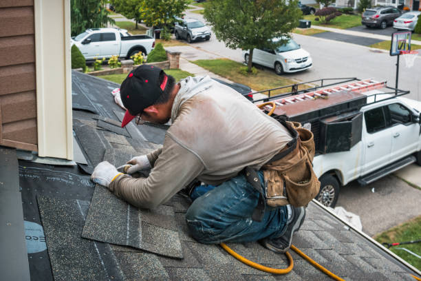 Professional Roof Replacement technician working in Midfield, TX